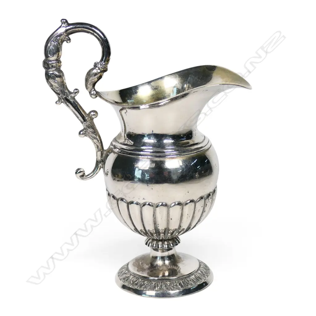 An early 19thC Continental .750 standard silver cream jug, Image 1++