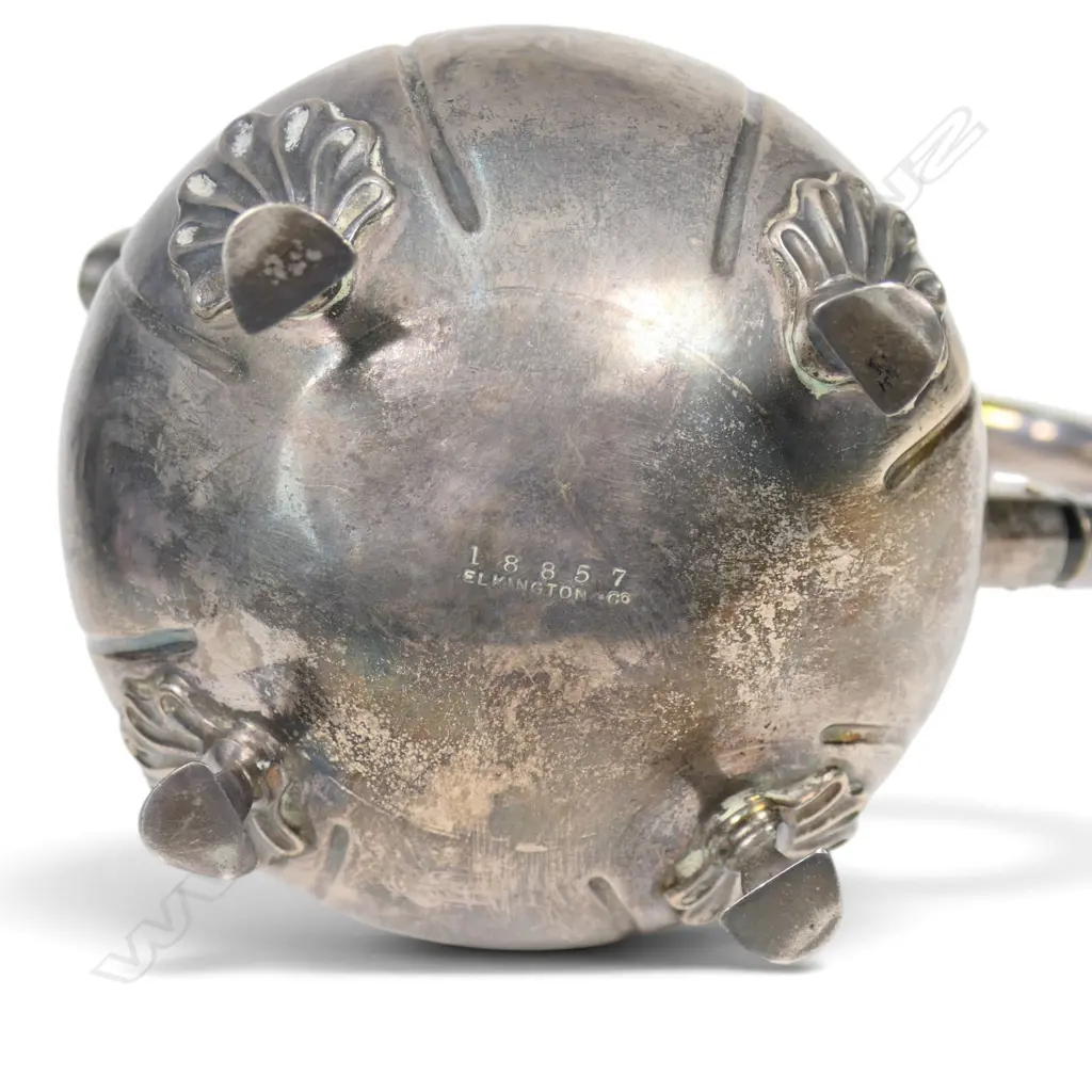 An Edwardian silver hot water pot, fluted ovoid body. Birmingham 1906. Handle plated. 533gms. Image 1++