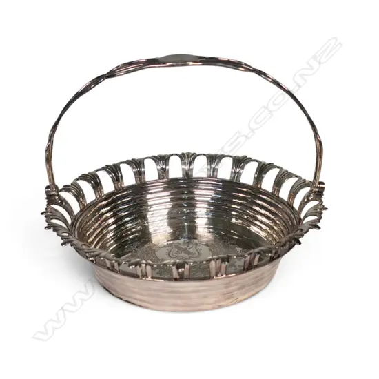 A George III silver circular cake basket,