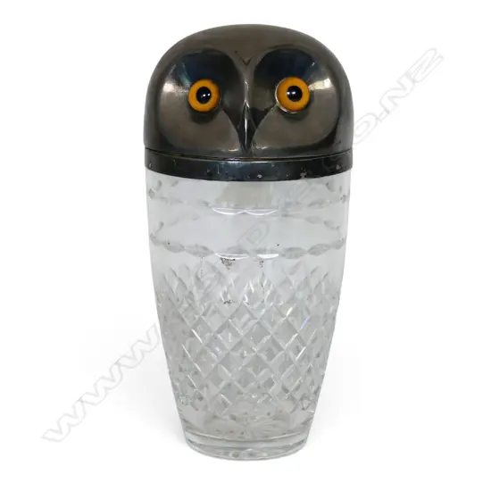 A mid-20thC silver plate and crystal cocktail shaker,