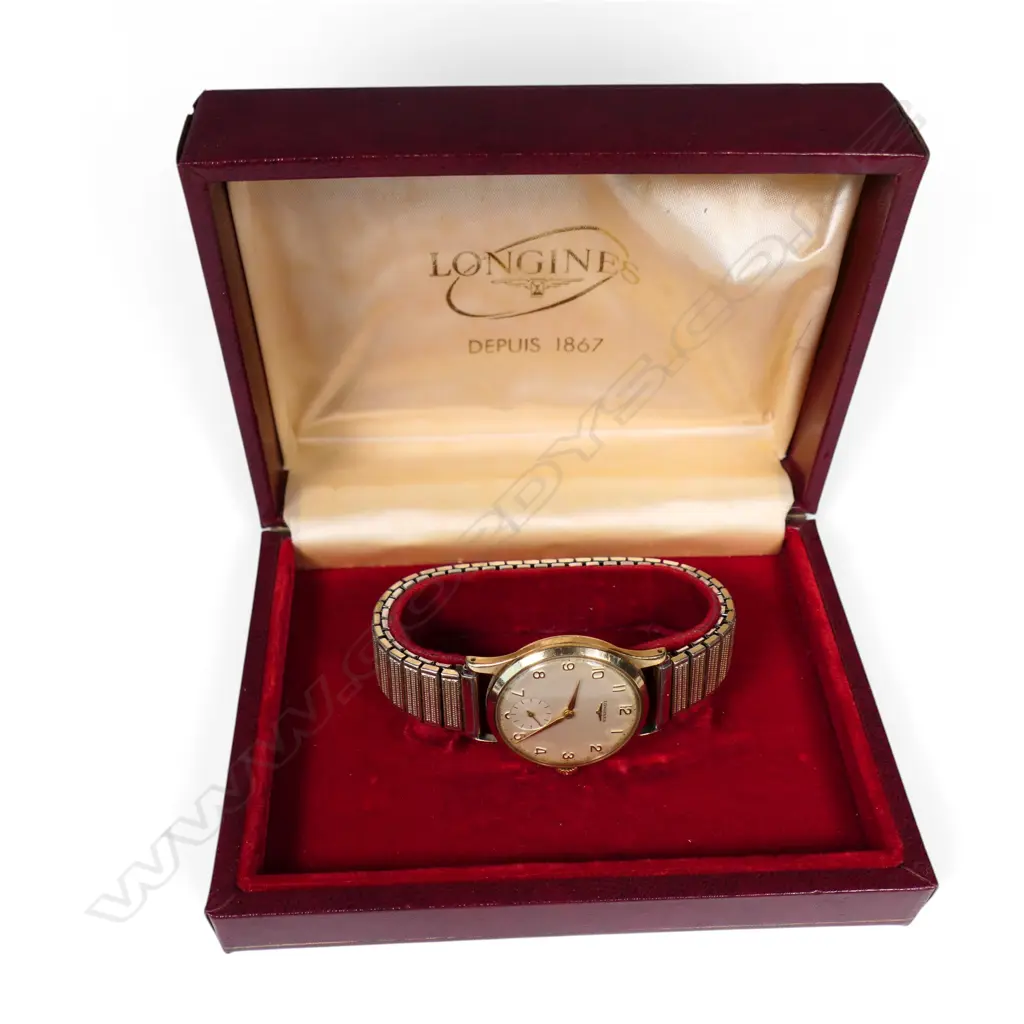 A vintage 9ct gold Longines wrist watch, Image 1++