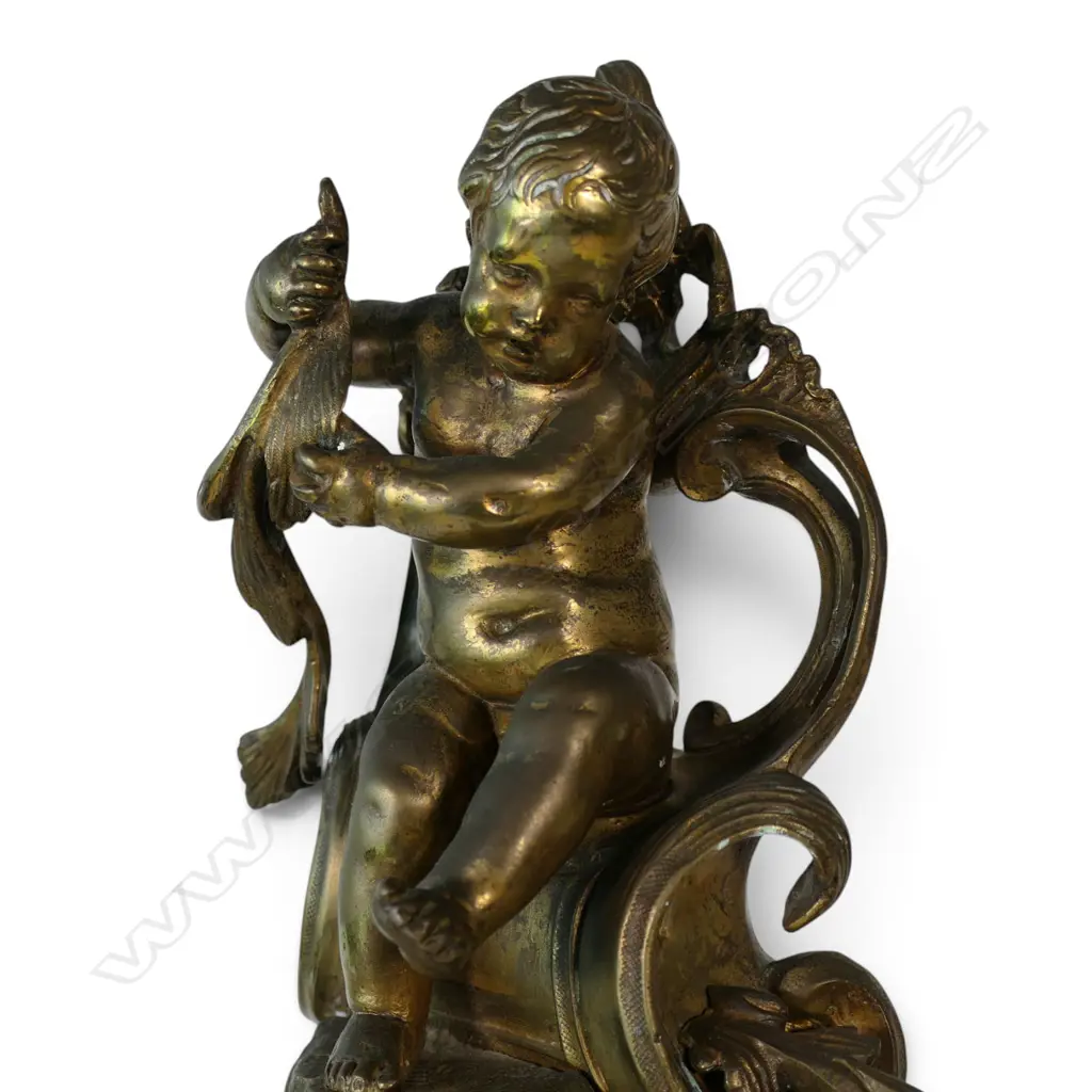 A French Louis XV style brass mantel clock, Image 1++