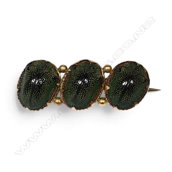 A Victorian 9ct rose gold scarab beetle brooch,