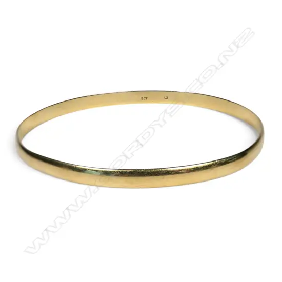 A 9ct gold bangle,