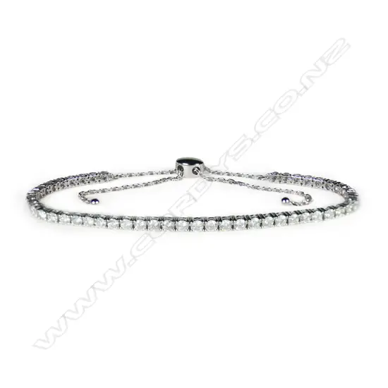A 14ct white gold and diamond bolo style tennis bracelet,