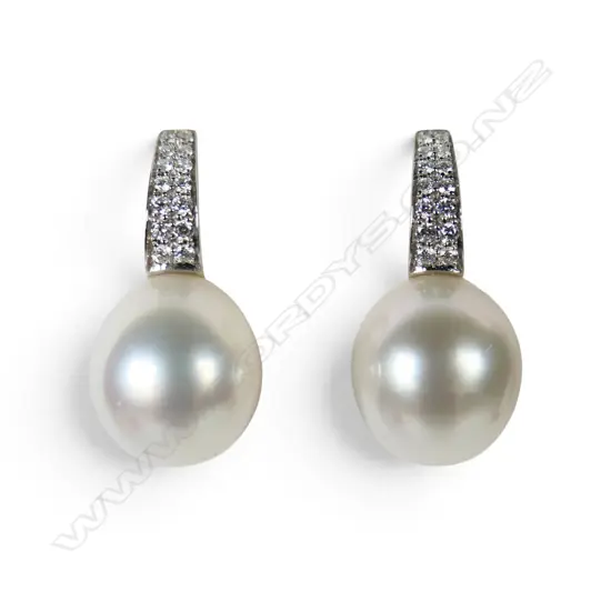 A pair of 18ct white gold diamond and Autore pearl earrings,