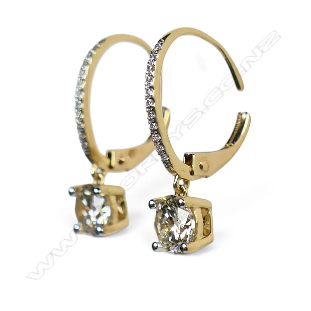A pair of 18ct gold and diamond drop earrings, Image 1++