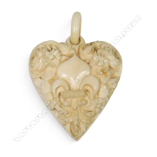 A 19thC French ivory heart pendant,