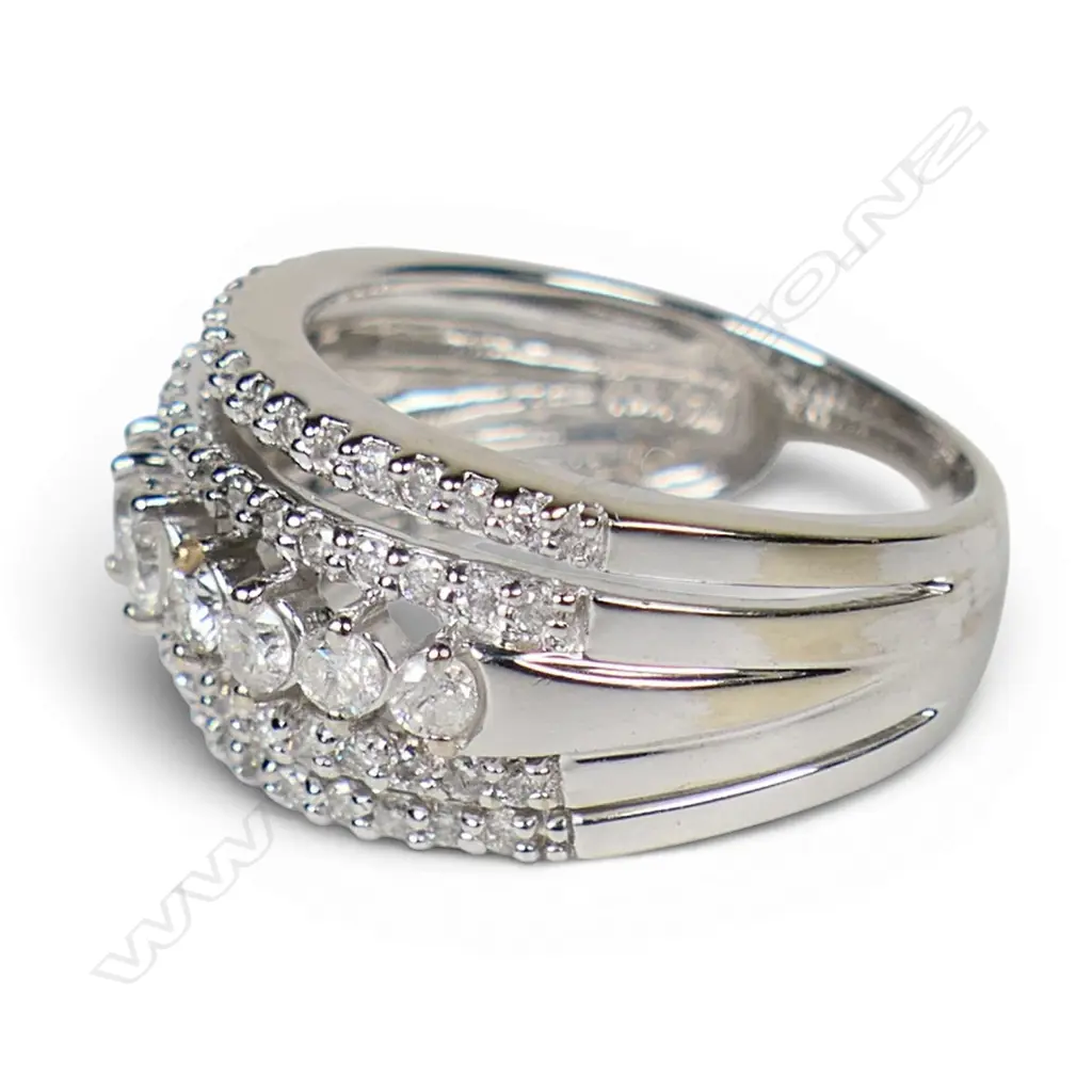 A modern 10ct white gold and multi diamond banded ring, Image 1++