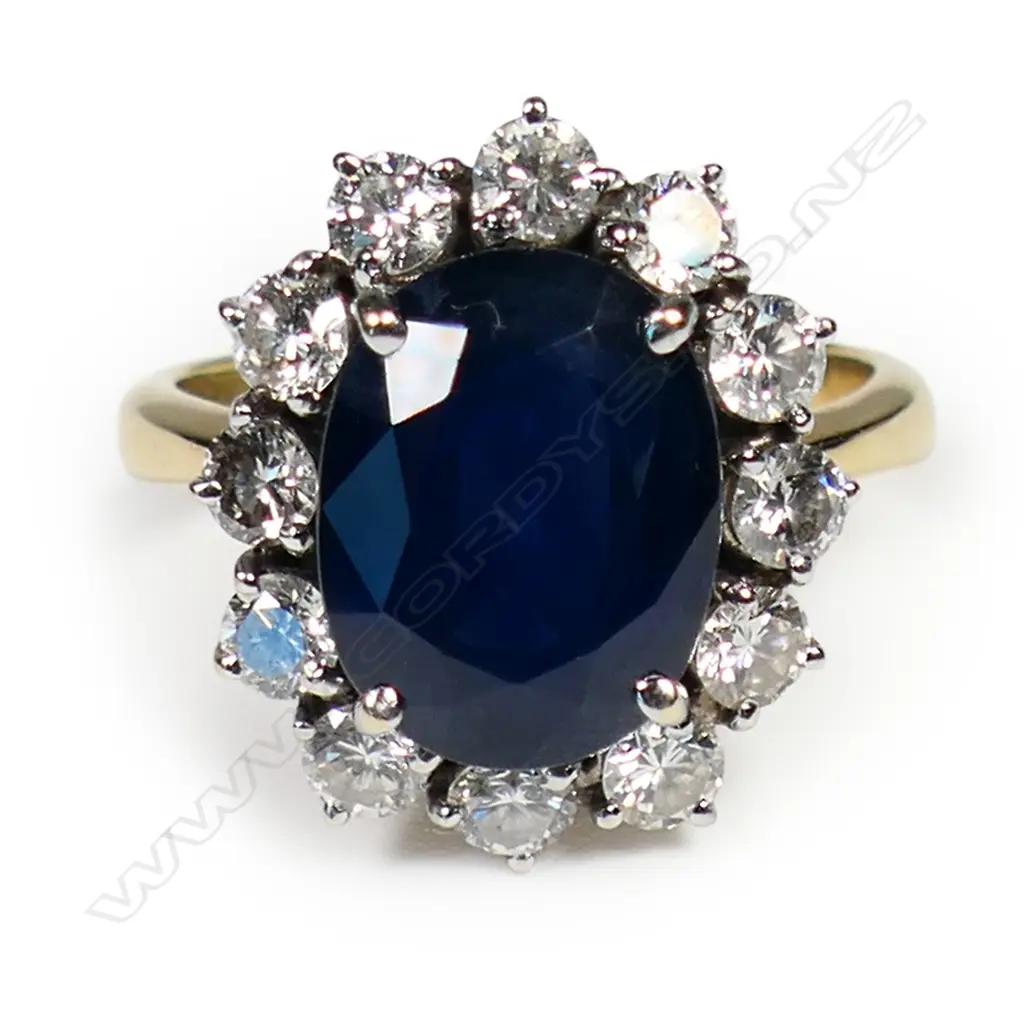 An 18ct gold sapphire and diamond dress ring, Image 1++