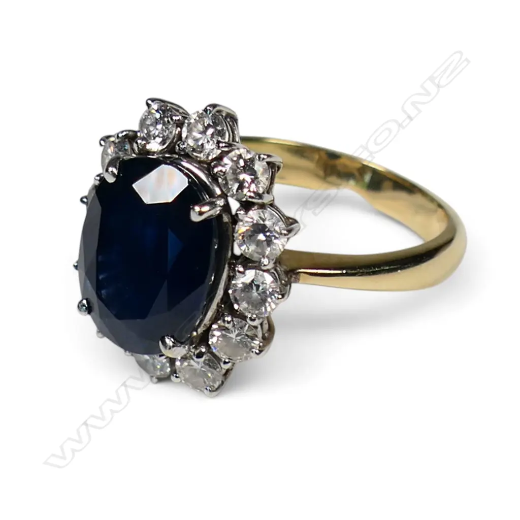 An 18ct gold sapphire and diamond dress ring, Image 1++