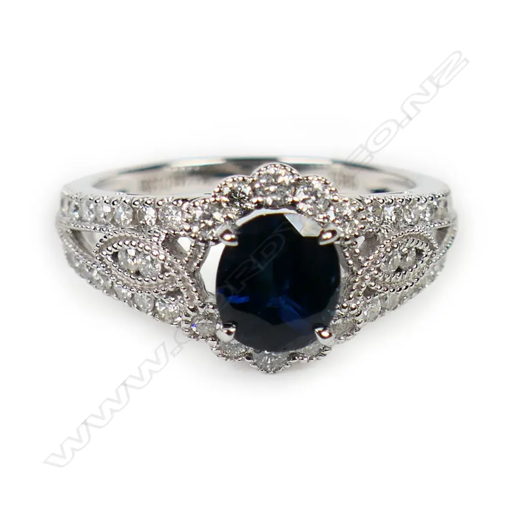 A 14ct white gold and blue Ceylonese Sapphire and diamond dress ring, Image 1++