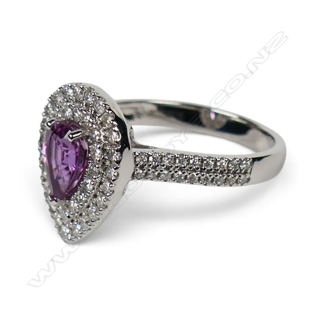 A 14ct white gold pink sapphire and diamond double halo ring, Image 1++