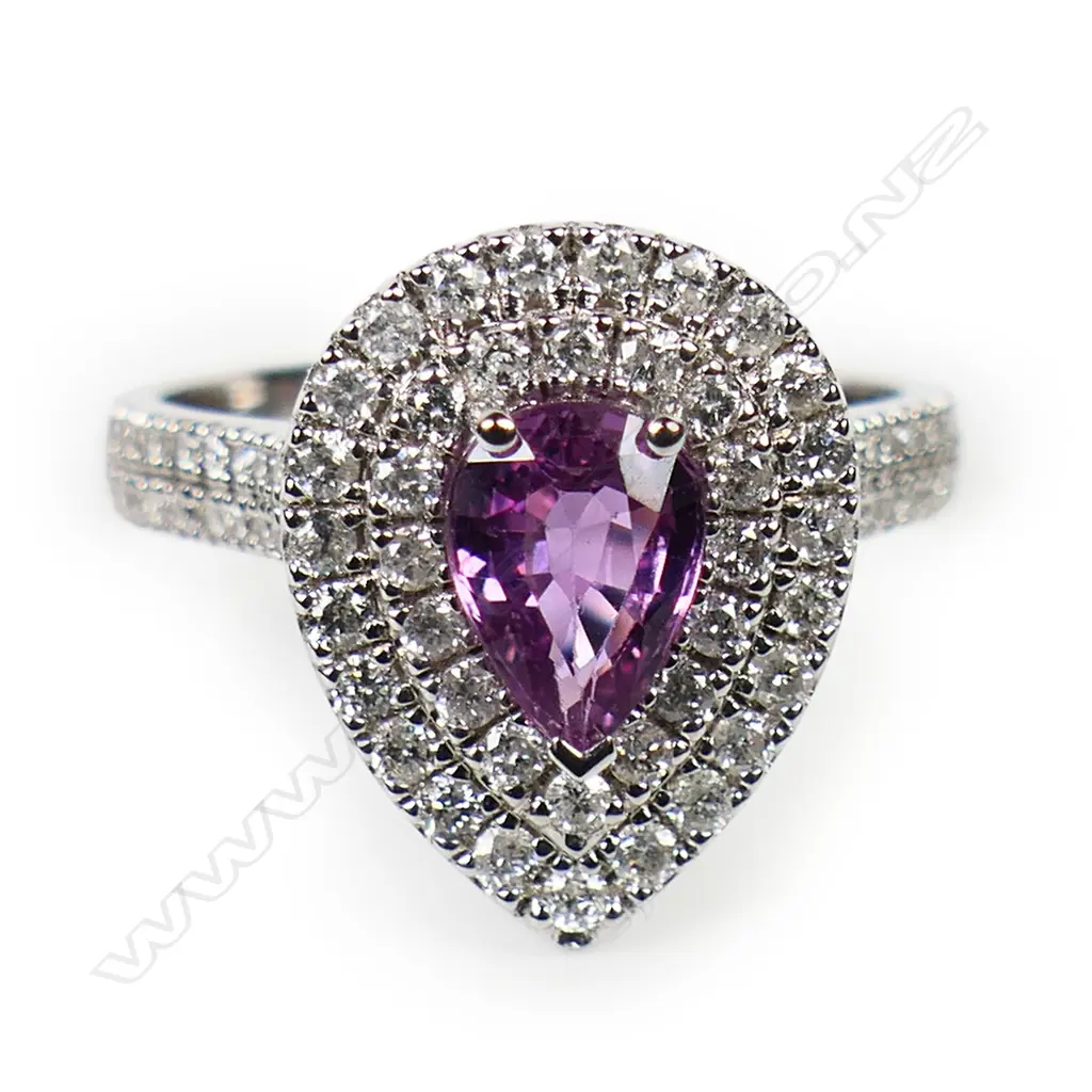 A 14ct white gold pink sapphire and diamond double halo ring, Image 1++