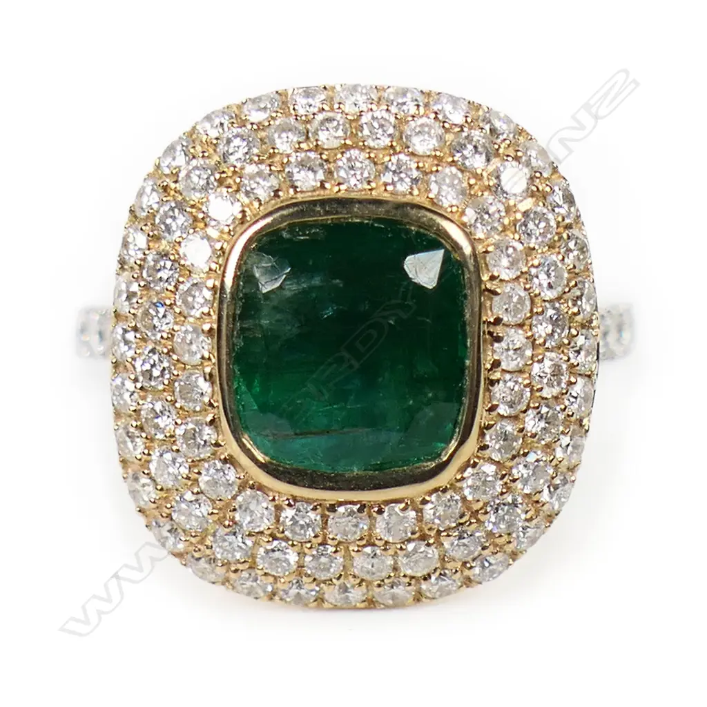 A 14ct white and yellow gold emerald and diamond halo cocktail ring, Image 1++