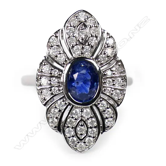 A 14ct white gold sapphire and diamond dress ring,