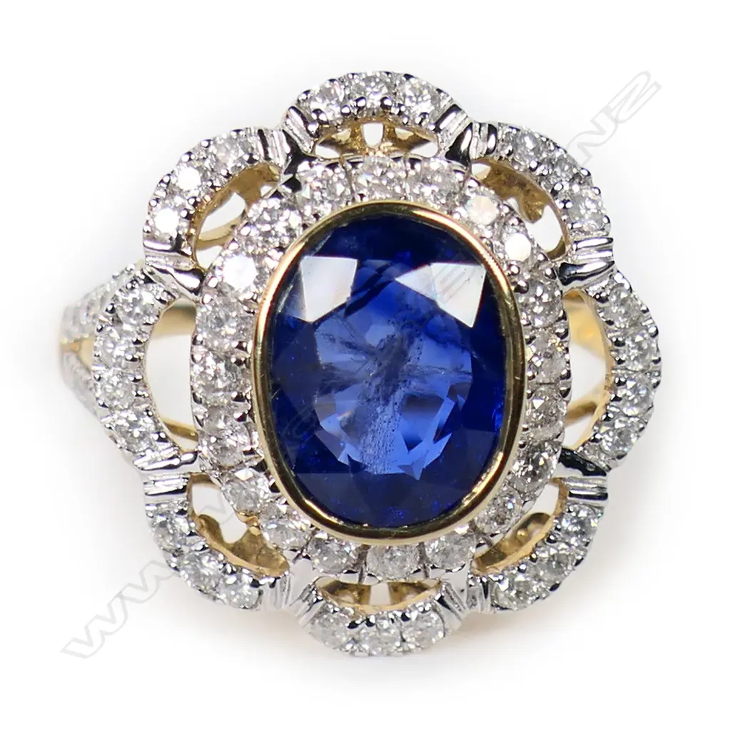 A 14ct gold Ceylonese sapphire and diamond floral style ring, Image 1++
