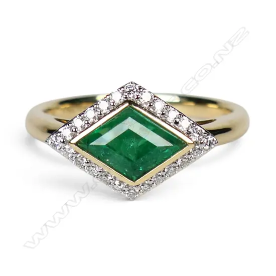An 18ct gold Zambian emerald and diamond ring,