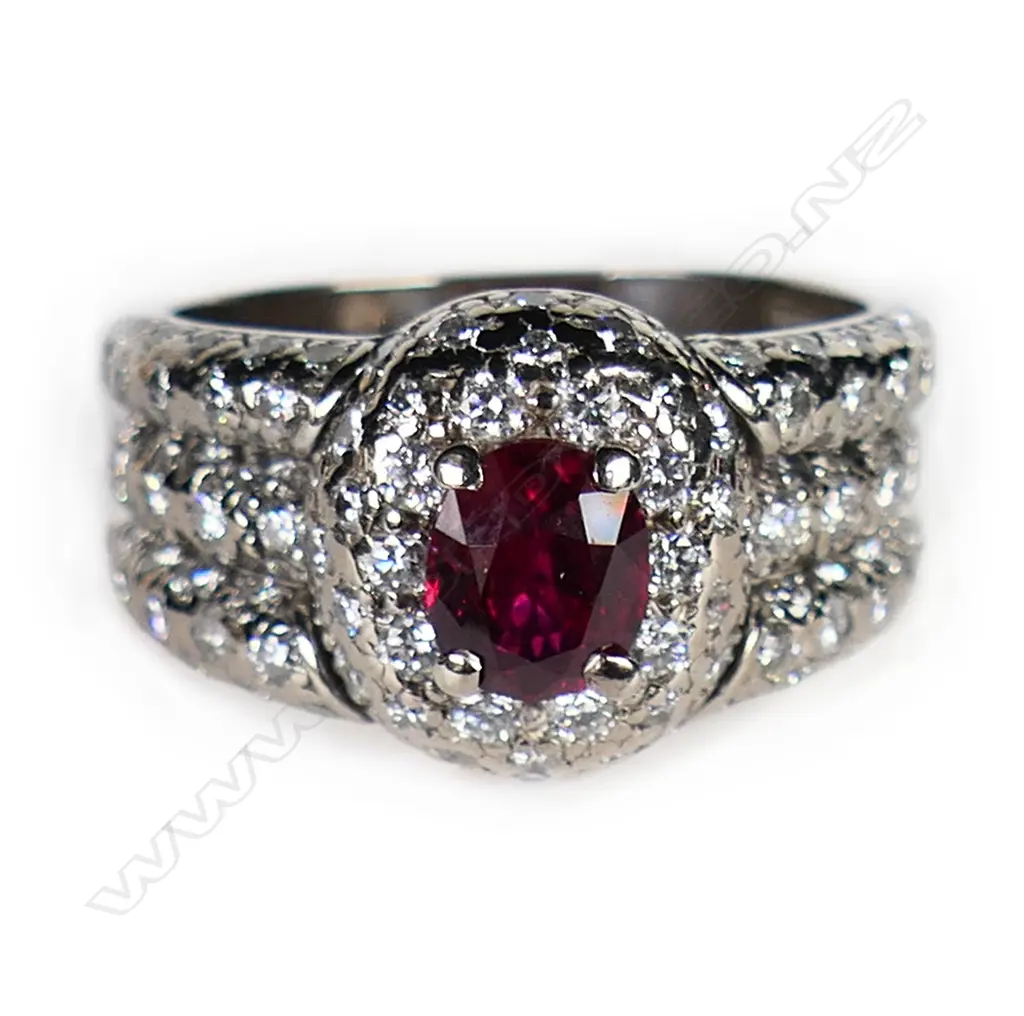An 18ct white gold ruby and diamond dress ring, Image 1++