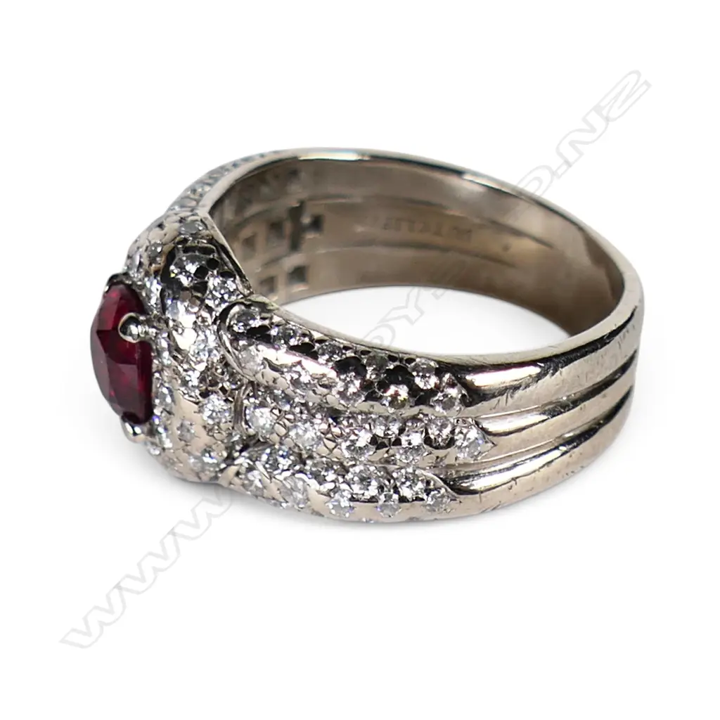 An 18ct white gold ruby and diamond dress ring, Image 1++
