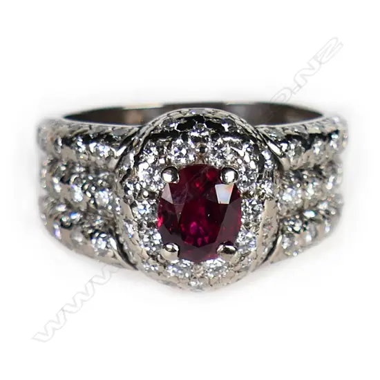 An 18ct white gold ruby and diamond dress ring,