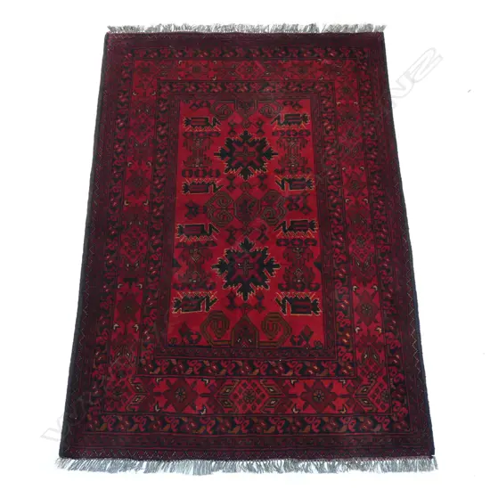 A hand-knotted Andkhoy rug,