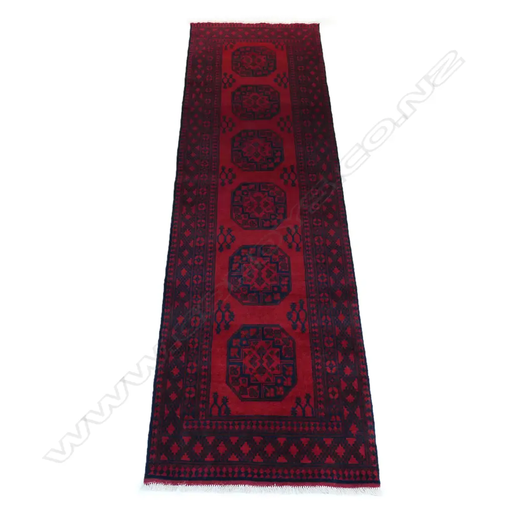 A hand-knotted elephant foot runner, Image 1++