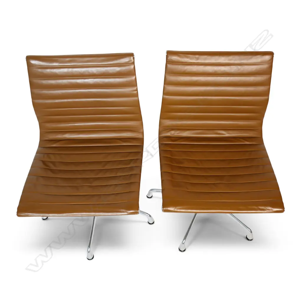 A pair of tan leather Eames conference swivel chairs, Image 1++