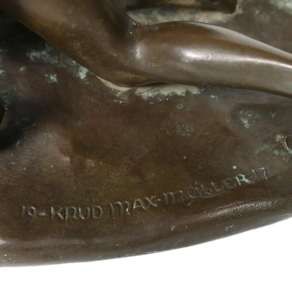 A bronze sculpture of boys wrestling a mole, Image 1++