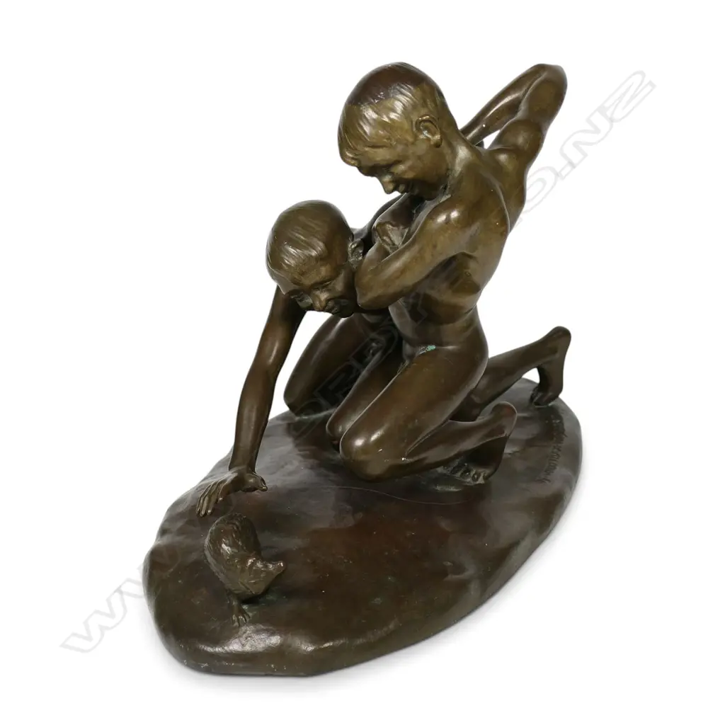 A bronze sculpture of boys wrestling a mole, Image 1++
