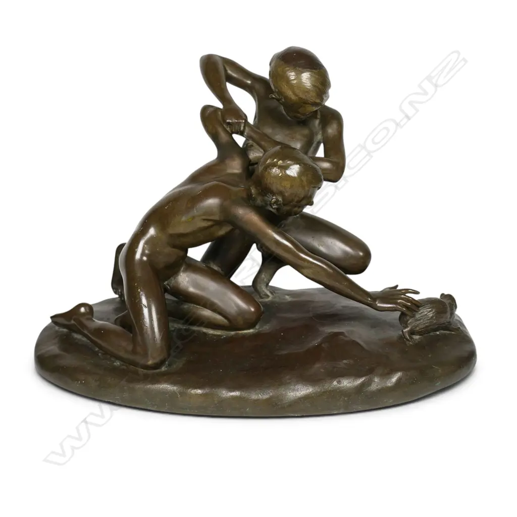 A bronze sculpture of boys wrestling a mole, Image 1++