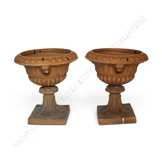 A pair of 19thC salt glaze terracotta garden urns,