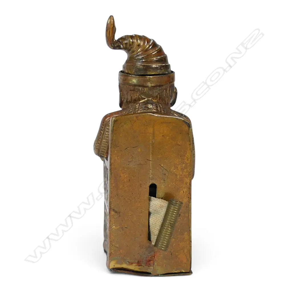 A c.1900 gilt brass Punch sewing tape measure, Image 1++