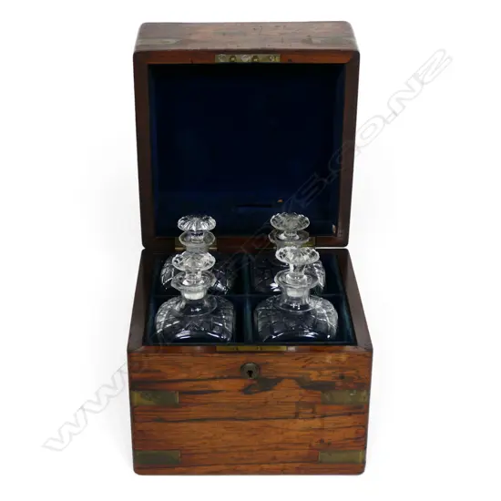 A quality early Victorian Rosewood and brass inlaid ship's four bottle tantalus,