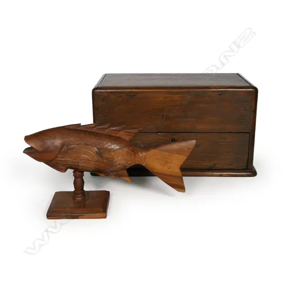 An early 20thC oak writing box and Pitcairn Island carved wooden fish,