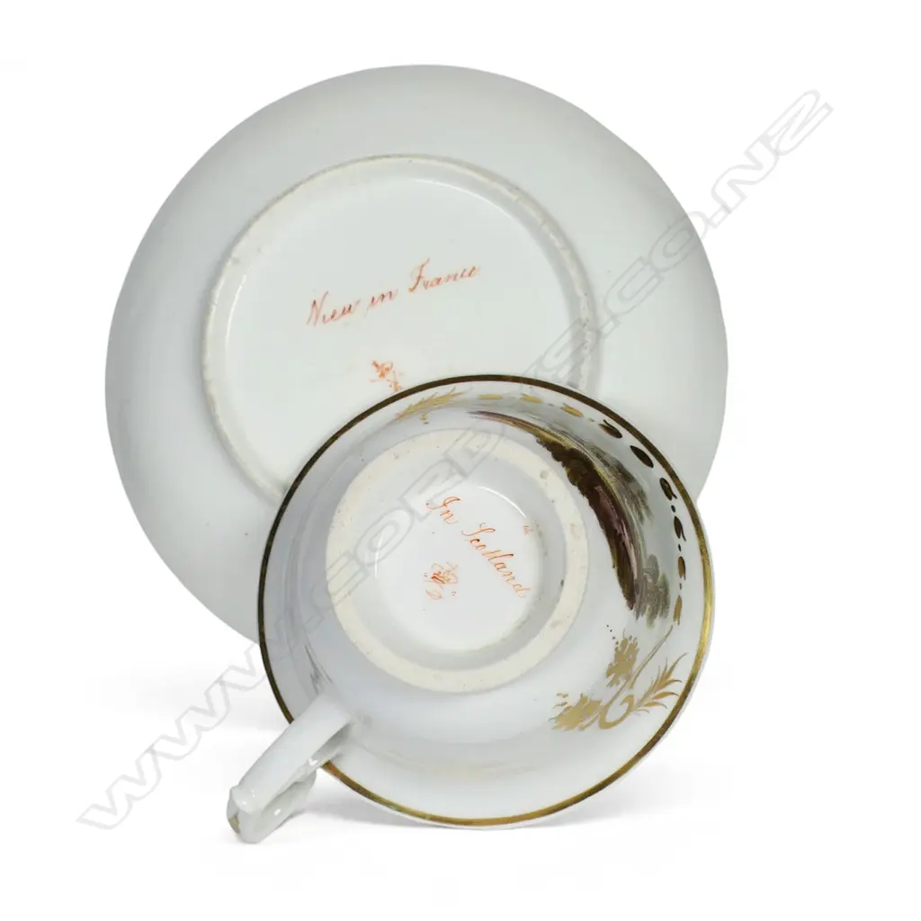 An early 19thC Derby hand painted cup and saucer, Image 1++