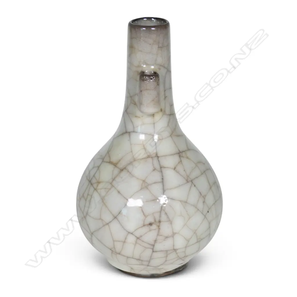 A Chinese crackle celadon glaze bottle form vase, Image 1++