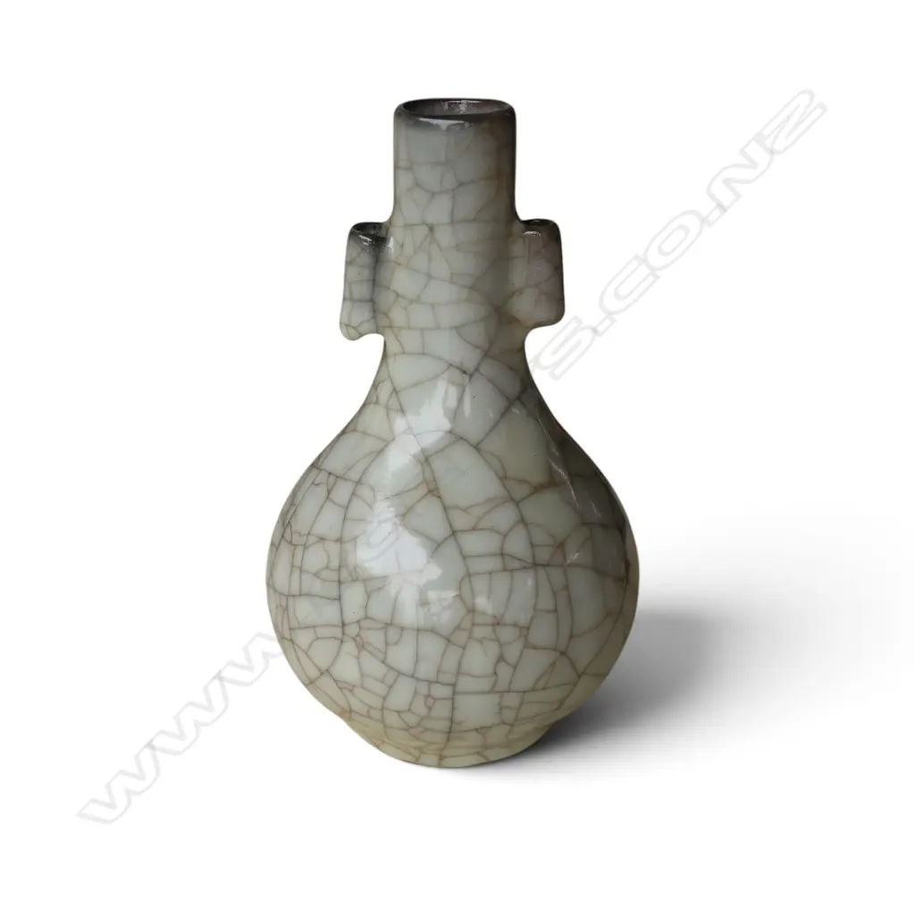 A Chinese crackle celadon glaze bottle form vase, Image 1++