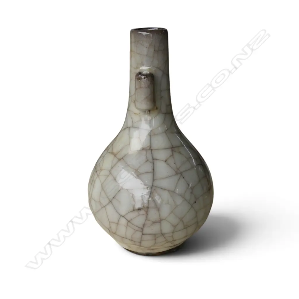 A Chinese crackle celadon glaze bottle form vase, Image 1++