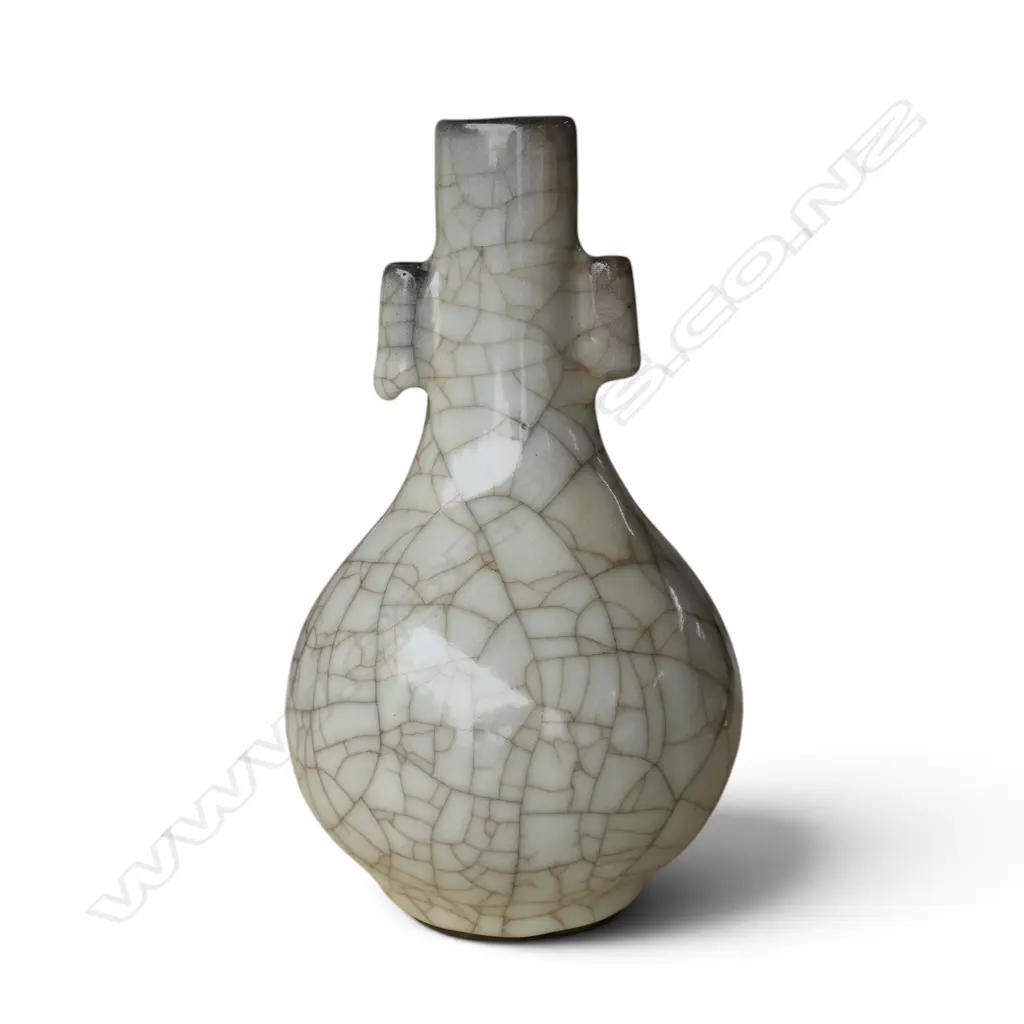 A Chinese crackle celadon glaze bottle form vase, Image 1++