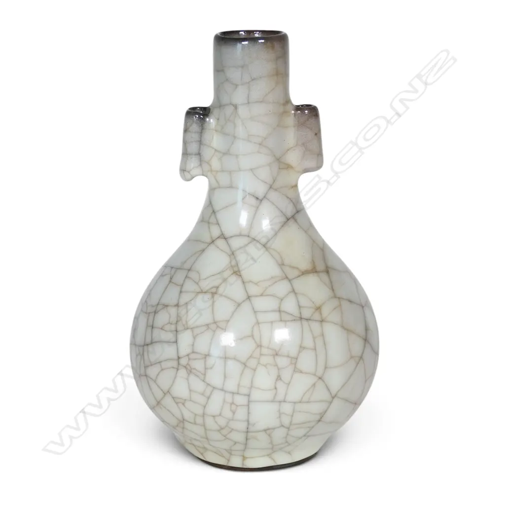 A Chinese crackle celadon glaze bottle form vase, Image 1++