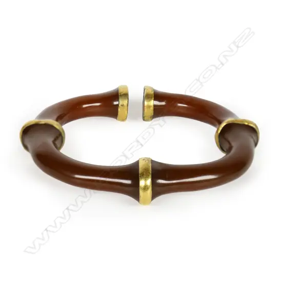 # A good Chinese orange/brown agate bangle,