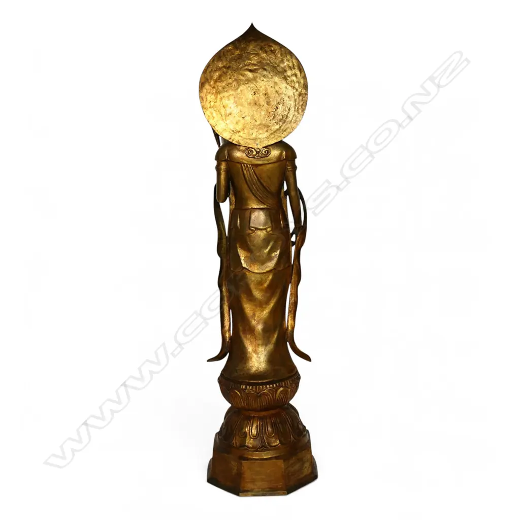 A large floor standing gilt bronze figure of Kuanyin, Image 1++