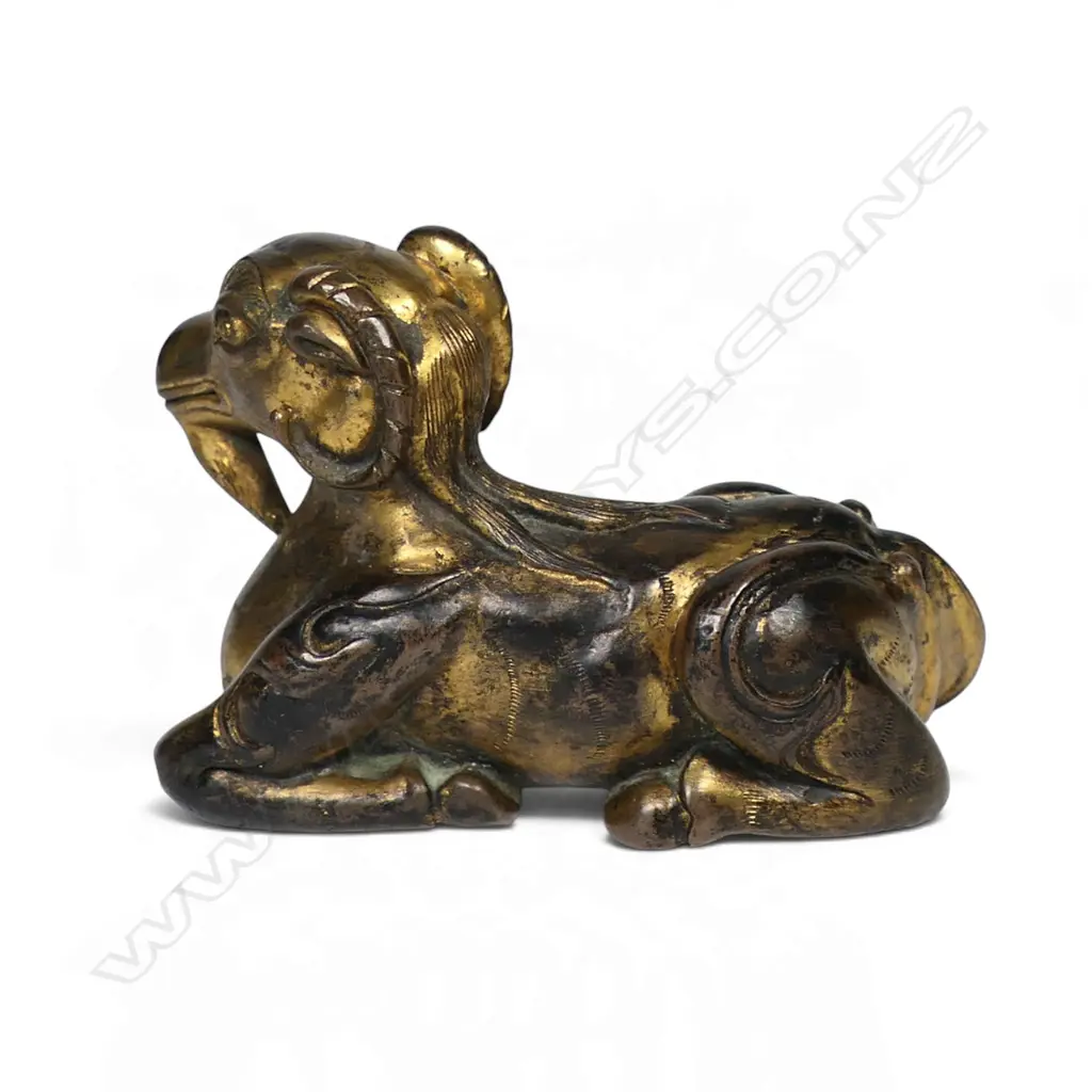 A gilt bronze mythical beast, Image 1++