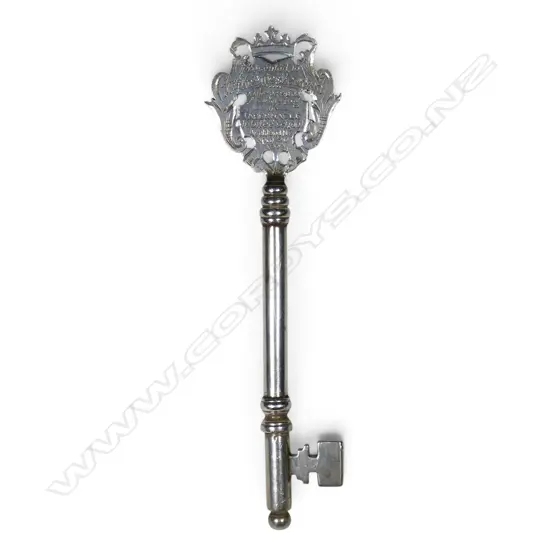 An early 20thC New Zealand silver presentation Key with 1909 Auckland School Inscription,