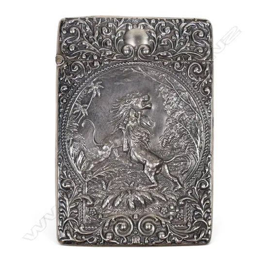 An Edwardian silver embossed card case,