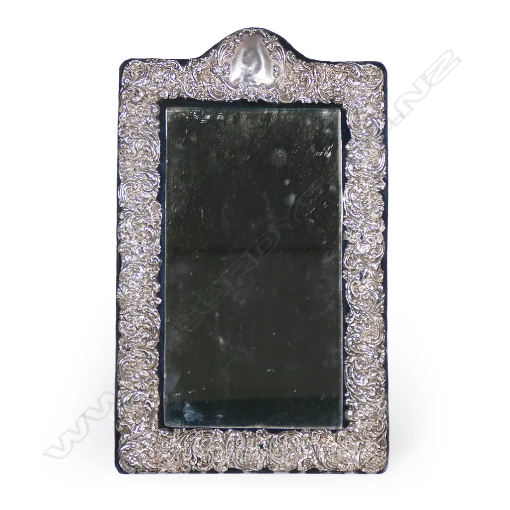 A large Edwardian embossed silver dressing table mirror, Image 1++