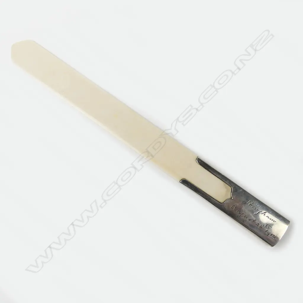 An early 20thC silver handled long ivory paper knife, Image 1++