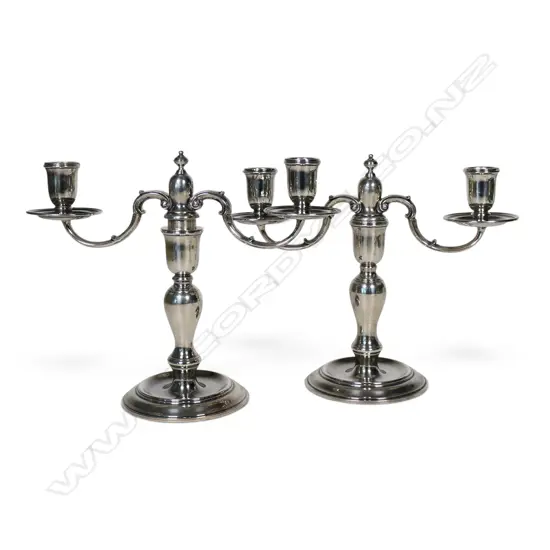 A pair of silver baluster table candelabra,