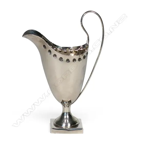 A Victorian silver tall helmet cream jug,